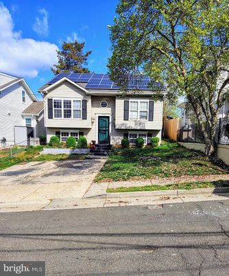 Exterior, Facade, Solar Panels, Raised Ranch
