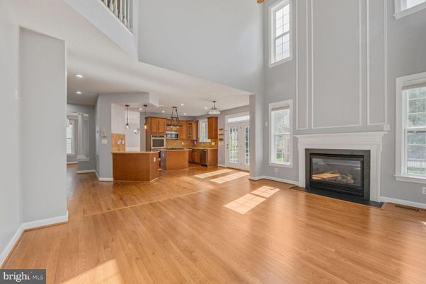 Fireplace, Interior, Kitchen, Pendant Lights, Recessed Lighting, Stainless Steel Appliances, Wood Texture Flooring