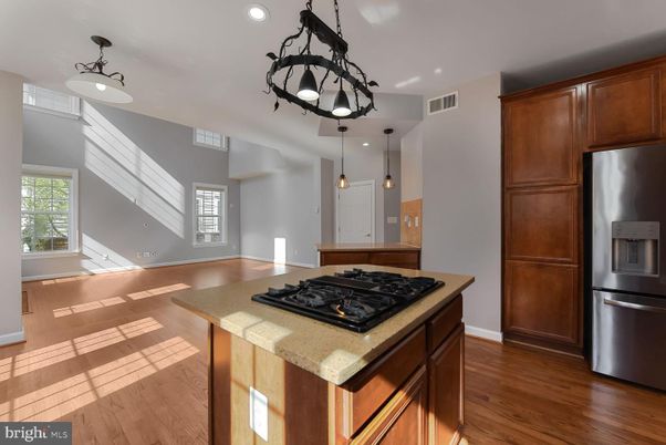 Chandelier, Interior, Kitchen, Pendant Lights, Recessed Lighting, Stainless Steel Appliances, Wood Texture Flooring