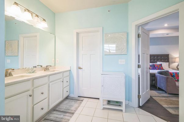Bathroom, Bedroom, Dual Sink Vanities, Interior, Recessed Lighting, Wood Texture Flooring
