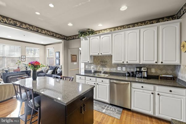 Dining room, Interior, Kitchen, Recessed Lighting, Stainless Steel Appliances, Wood Texture Flooring