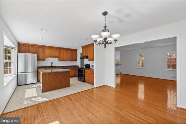 Chandelier, Interior, Kitchen, Recessed Lighting, Stainless Steel Appliances, Wood Texture Flooring
