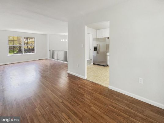 Empty room, Interior, Kitchen, Stainless Steel Appliances, Wood Texture Flooring