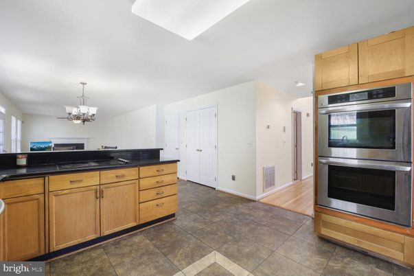Chandelier, Interior, Kitchen, Recessed Lighting, Stainless Steel Appliances, Wood Texture Flooring