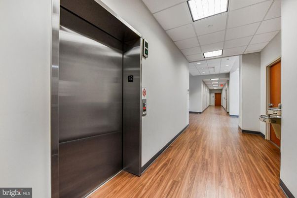 Elevator, Interior, Recessed Lighting, Wood Texture Flooring