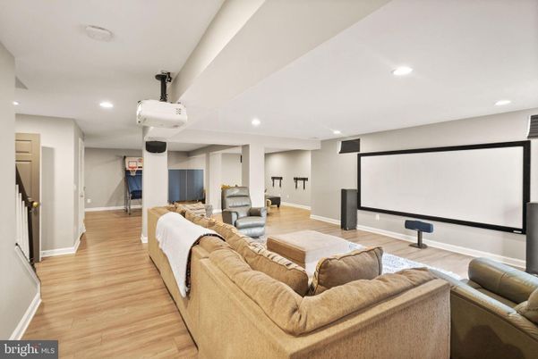 Interior, Living room, Projection Screen, Recessed Lighting, Wood Texture Flooring