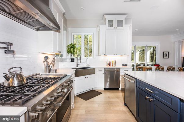 Dining room, Interior, Kitchen, Recessed Lighting, Stainless Steel Appliances, Wood Texture Flooring