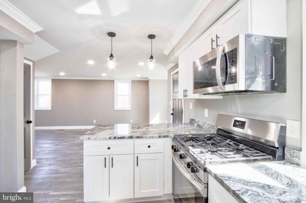 Interior, Kitchen, Pendant Lights, Recessed Lighting, Stainless Steel Appliances, Wood Texture Flooring