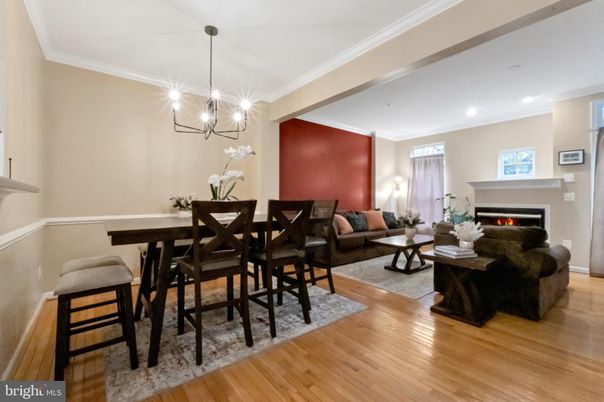 Dining room, Fireplace, Interior, Living room, Pendant Lights, Recessed Lighting, Wood Texture Flooring