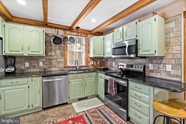 Interior, Kitchen, Recessed Lighting, Stainless Steel Appliances, Stone Walls, Wooden Beams