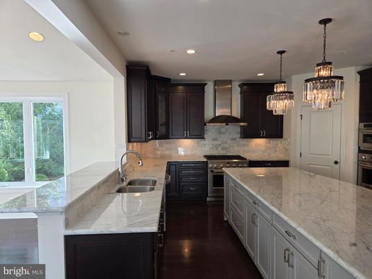 Chandelier, Interior, Kitchen, Pendant Lights, Recessed Lighting, Stainless Steel Appliances, Wood Texture Flooring