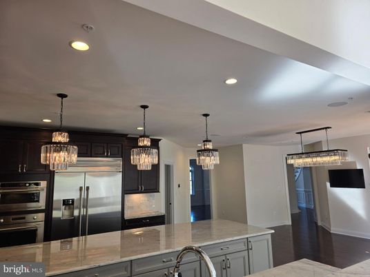 Chandelier, Interior, Kitchen, Pendant Lights, Recessed Lighting, Stainless Steel Appliances, Wood Texture Flooring