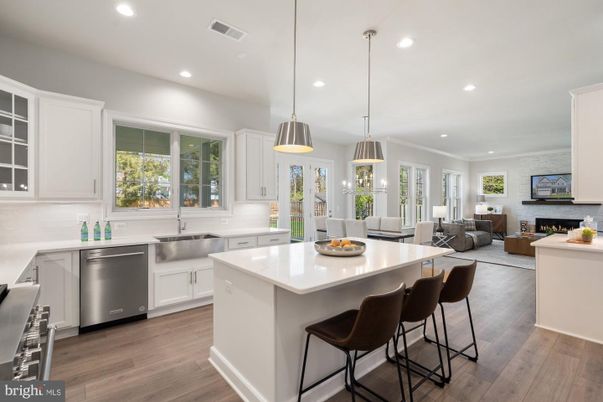 Dining room, Fireplace, Interior, Kitchen, Living room, Pendant Lights, Recessed Lighting, Stainless Steel Appliances, Wood Texture Flooring