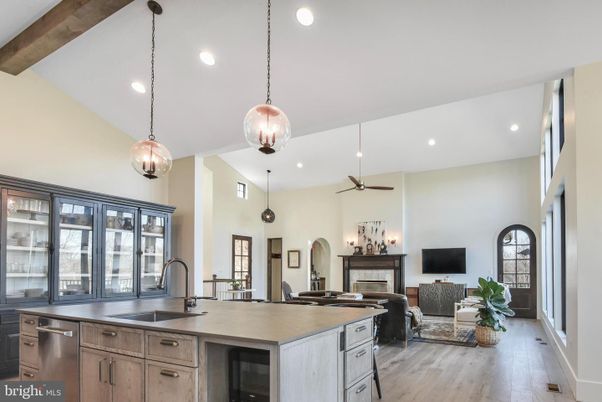 Fireplace, Interior, Kitchen, Living room, Pendant Lights, Recessed Lighting, Stainless Steel Appliances, Wooden Beams, Wood Texture Flooring