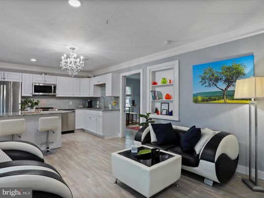 Chandelier, Interior, Kitchen, Living room, Recessed Lighting, Stainless Steel Appliances, Wood Texture Flooring