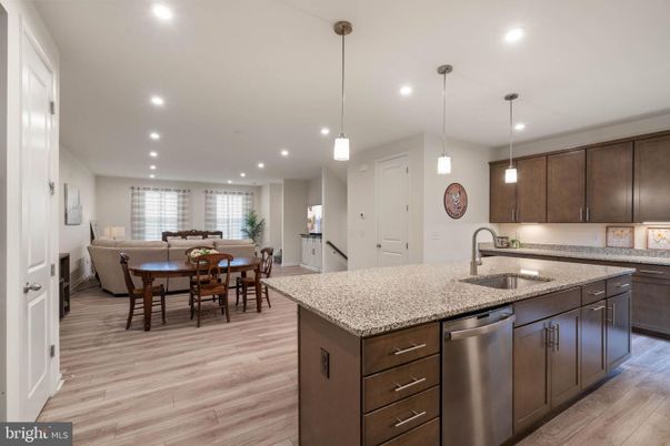 Dining room, Interior, Kitchen, Living room, Pendant Lights, Recessed Lighting, Stainless Steel Appliances, Wood Texture Flooring
