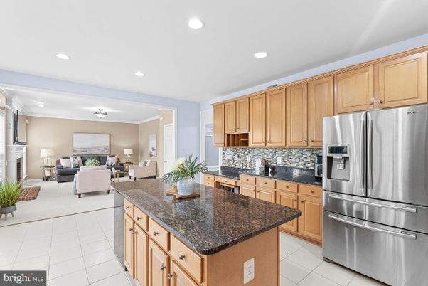 Fireplace, Interior, Kitchen, Living room, Recessed Lighting, Stainless Steel Appliances