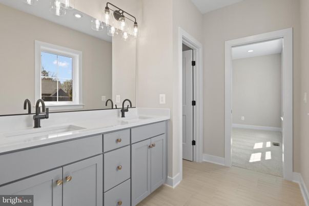 Bathroom, Dual Sink Vanities, Interior, Recessed Lighting, Wood Texture Flooring