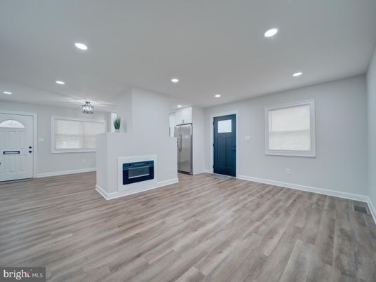 Empty room, Fireplace, Interior, Recessed Lighting, Wood Texture Flooring
