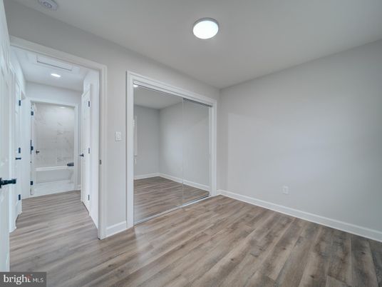 Bathroom, Empty room, Interior, Marble Walls, Recessed Lighting, Wood Texture Flooring