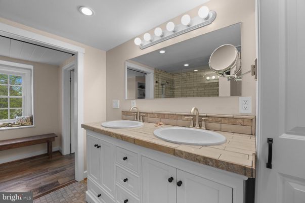 Bathroom, Dual Sink Vanities, Interior, Recessed Lighting, Tile Countertops, Wood Texture Flooring