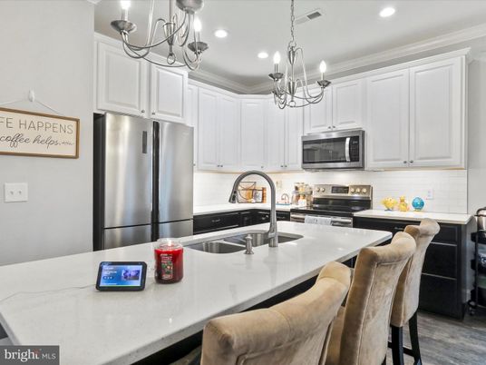 Chandelier, Interior, Kitchen, Pendant Lights, Recessed Lighting, Stainless Steel Appliances, Wood Texture Flooring