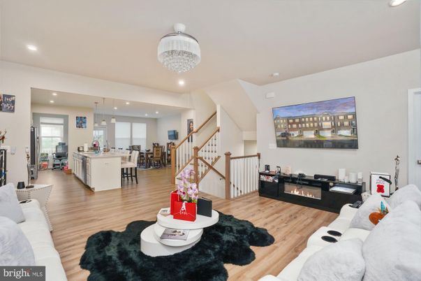 Chandelier, Dining room, Fireplace, Interior, Kitchen, Living room, Pendant Lights, Recessed Lighting, Wood Texture Flooring
