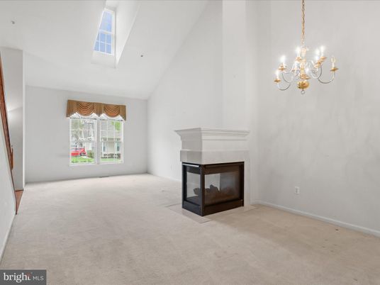 Chandelier, Empty room, Fireplace, Interior