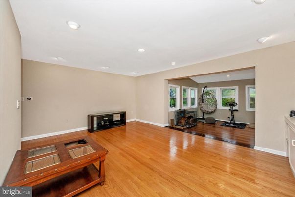 Fireplace, Fitness Equipment, Interior, Recessed Lighting, Wood Texture Flooring