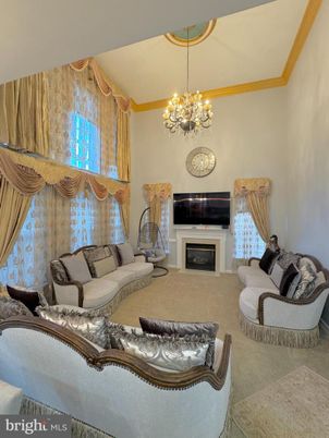 Chandelier, Fireplace, Interior, Living room
