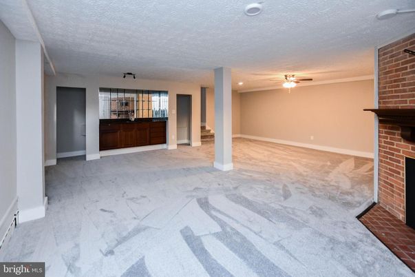 Empty room, Fireplace, Interior, Recessed Lighting, Stone Walls