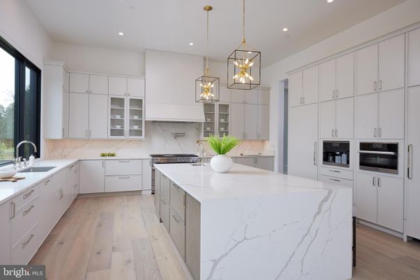 Interior, Kitchen, Marble Walls, Pendant Lights, Recessed Lighting, Wood Texture Flooring