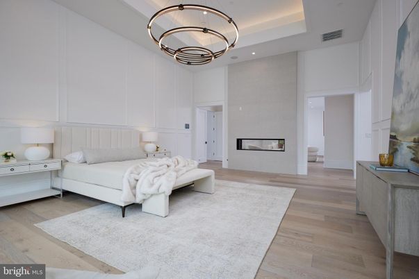 Bedroom, Fireplace, Interior, Pendant Lights, Recessed Lighting, Wood Texture Flooring