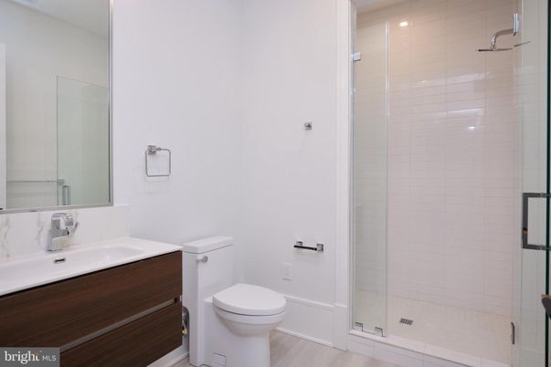 Bathroom, Glass Shower, Interior, Recessed Lighting, Wood Texture Flooring