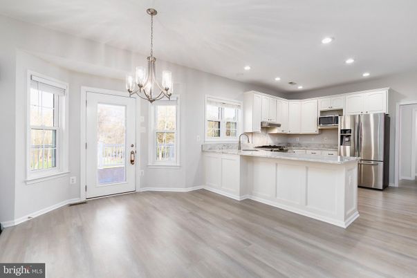Chandelier, Interior, Kitchen, Pendant Lights, Recessed Lighting, Stainless Steel Appliances, Wood Texture Flooring