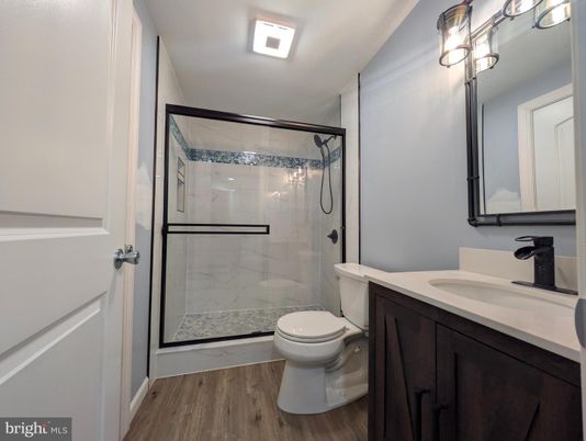 Bathroom, Glass Shower, Interior, Marble Walls, Wood Texture Flooring