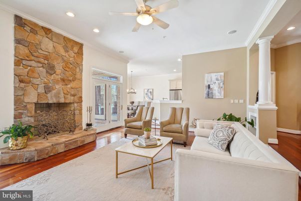 Fireplace, Interior, Kitchen, Living room, Recessed Lighting, Stone Walls, Wood Texture Flooring