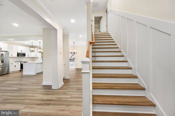 Chandelier, Interior, Kitchen, Pendant Lights, Recessed Lighting, Stainless Steel Appliances, Wood Texture Flooring