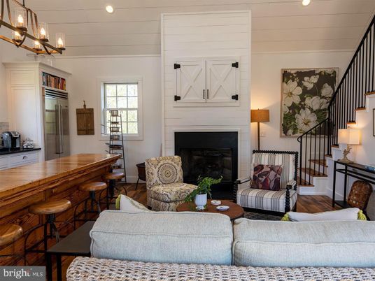 Chandelier, Fireplace, Interior, Kitchen, Living room, Recessed Lighting, Wood Texture Flooring