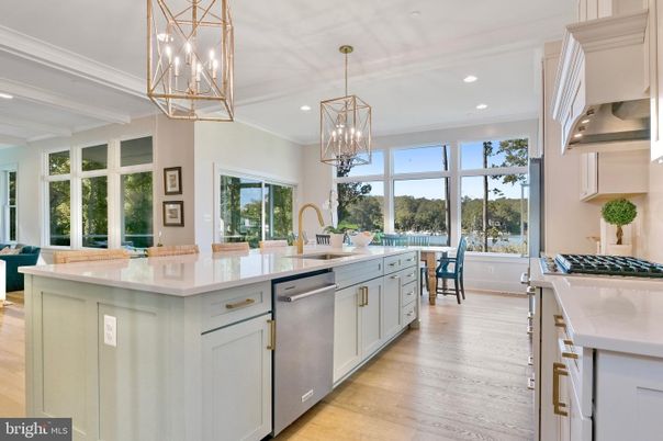 Chandelier, Dining room, Interior, Kitchen, Pendant Lights, Recessed Lighting, Stainless Steel Appliances, Wood Texture Flooring