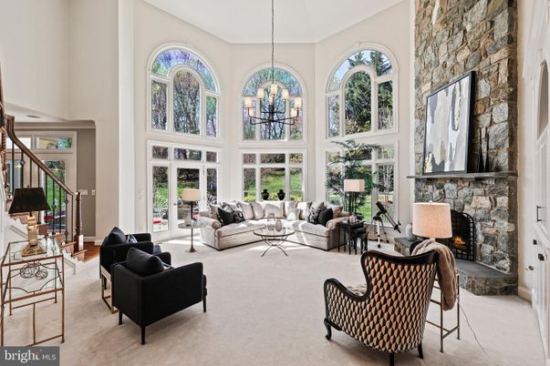 Chandelier, Fireplace, Interior, Living room, Stone Walls