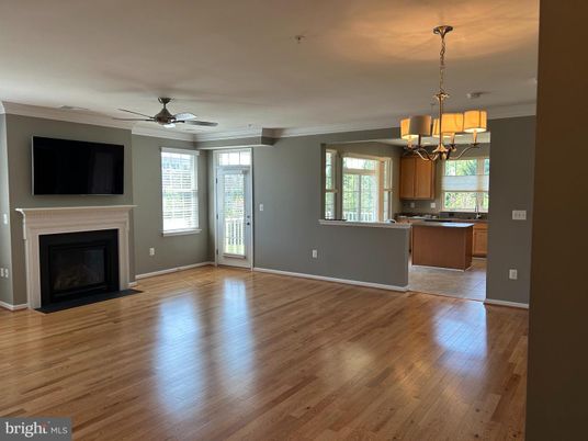 Chandelier, Empty room, Fireplace, Interior, Kitchen, Wood Texture Flooring