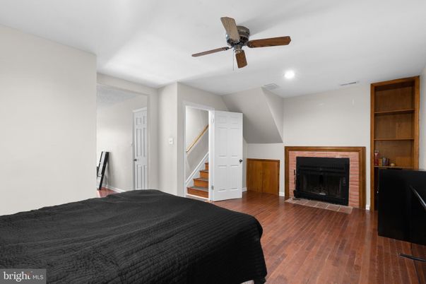 Bedroom, Fireplace, Interior, Recessed Lighting, Wood Texture Flooring