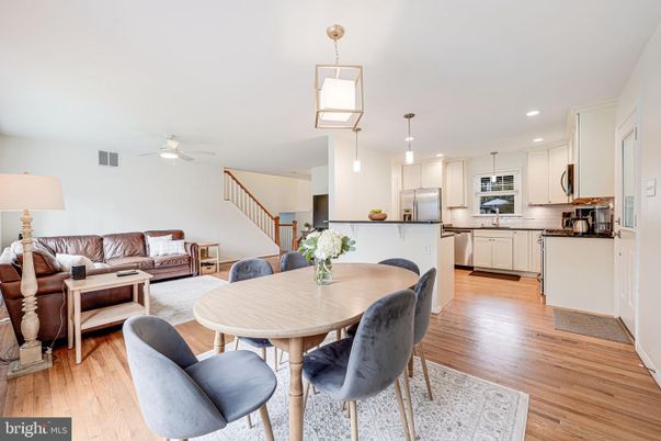 Dining room, Interior, Kitchen, Living room, Pendant Lights, Recessed Lighting, Stainless Steel Appliances, Wood Texture Flooring