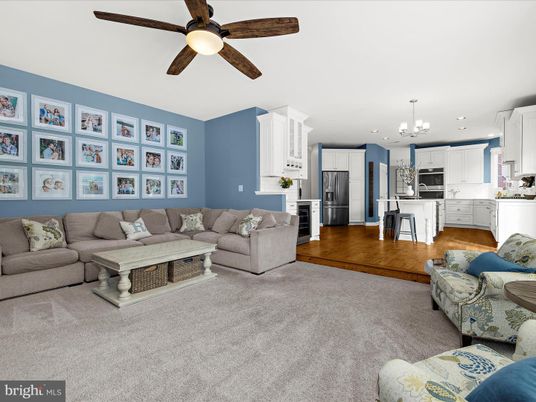 Chandelier, Interior, Kitchen, Living room, Recessed Lighting, Stainless Steel Appliances, Wood Texture Flooring