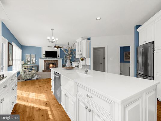 Chandelier, Fireplace, Interior, Kitchen, Living room, Pendant Lights, Recessed Lighting, Wood Texture Flooring