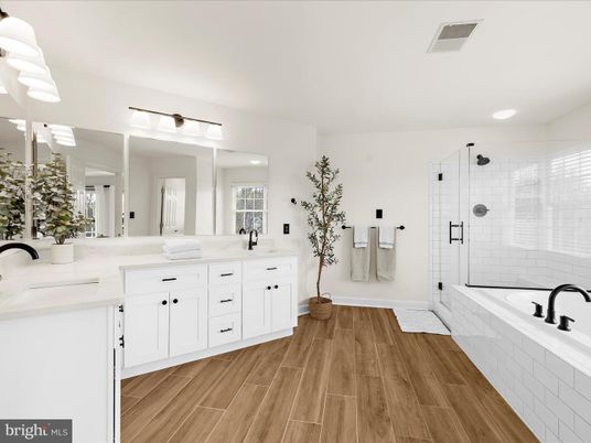 Bathroom, Dual Sink Vanities, Glass Shower, Interior, Recessed Lighting, Wood Texture Flooring
