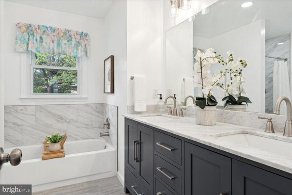 Bathroom, Dual Sink Vanities, Interior, Marble Walls, Recessed Lighting