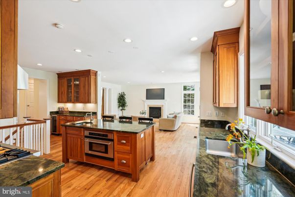 Fireplace, Interior, Kitchen, Living room, Recessed Lighting, Wood Texture Flooring