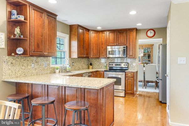Dining room, Interior, Kitchen, Recessed Lighting, Stainless Steel Appliances, Wood Texture Flooring